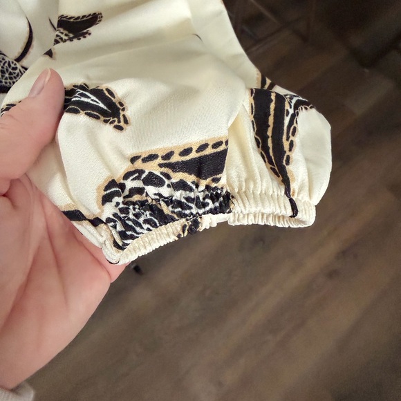 Elegant Women's Blouse with Black and Cream Floral Design - Picture 4 of 7